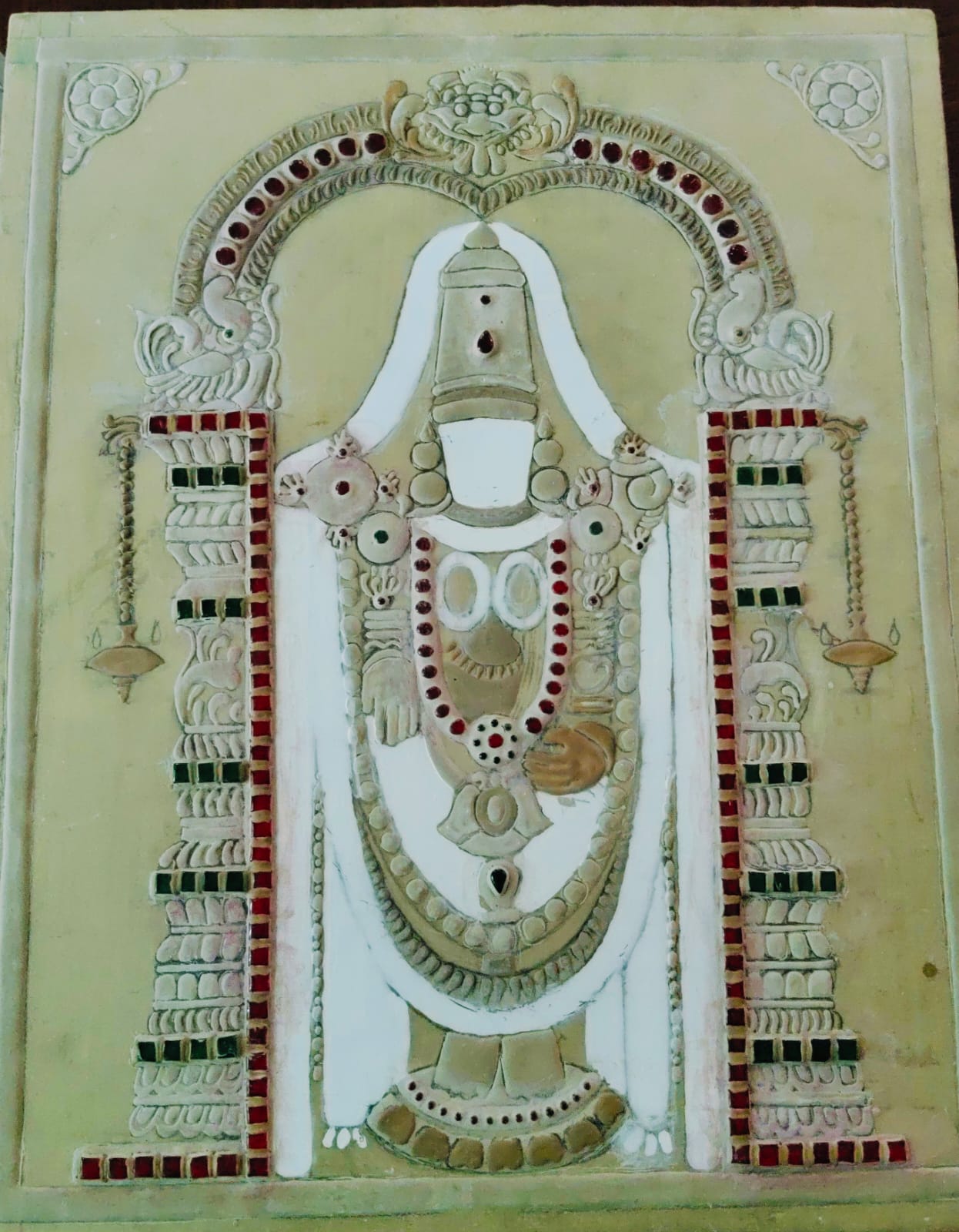 Venkateshwara painting in a pale ornate frame
